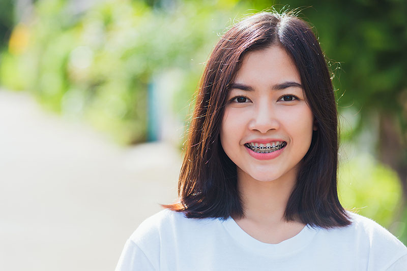 Teen smiling with braces